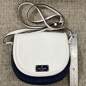 Used once! Looks new. Kate spade baby and white crossbody/shoulder bag